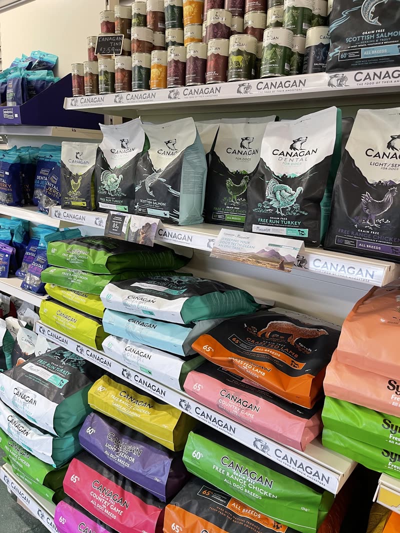 Shelves of natural dog food stacked in the shop